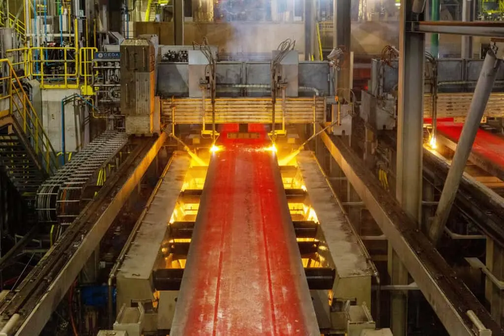 Red-hot steel slab on a continuous casting line at a steel producer